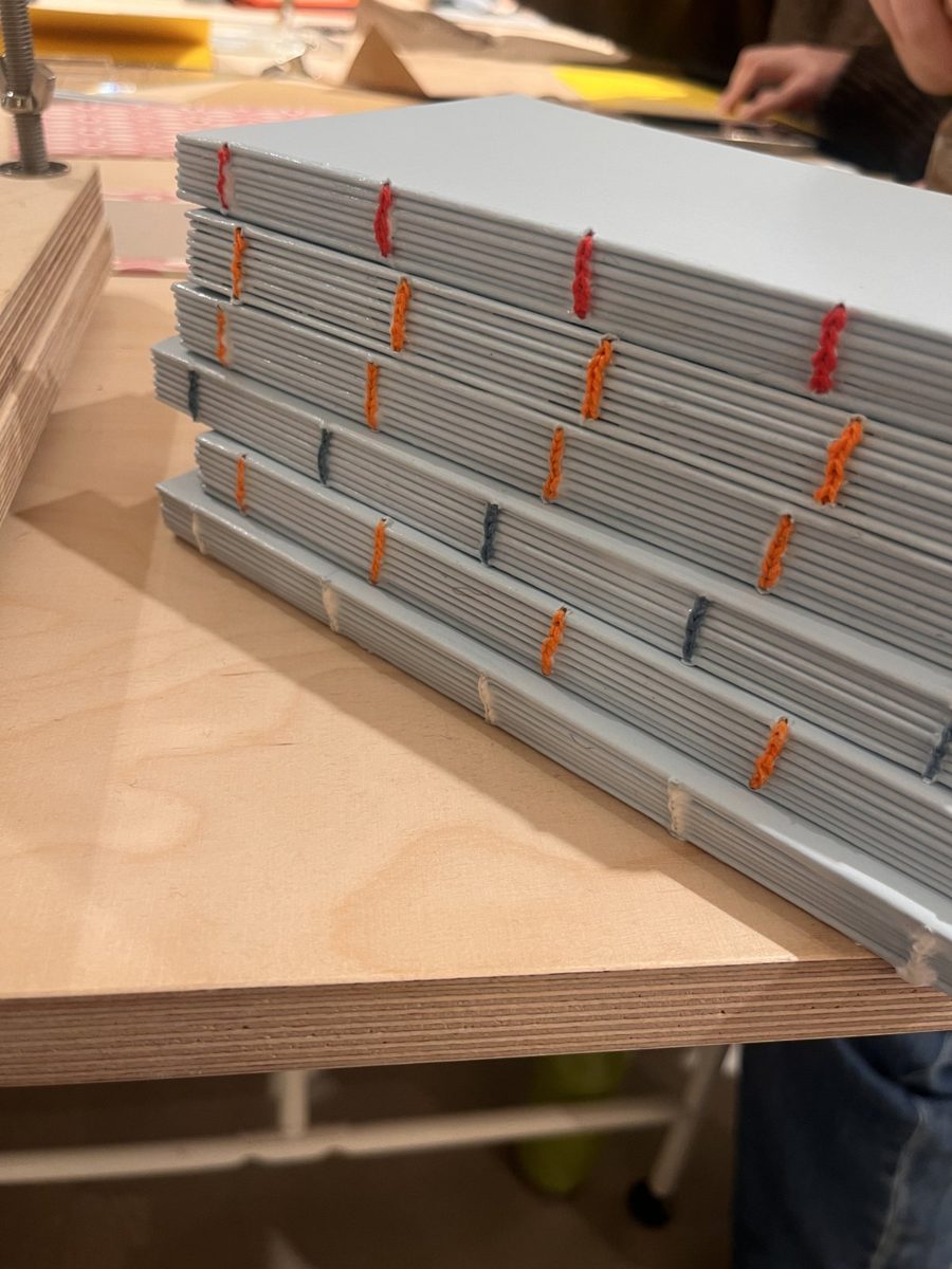 Stack of hand-sewn books