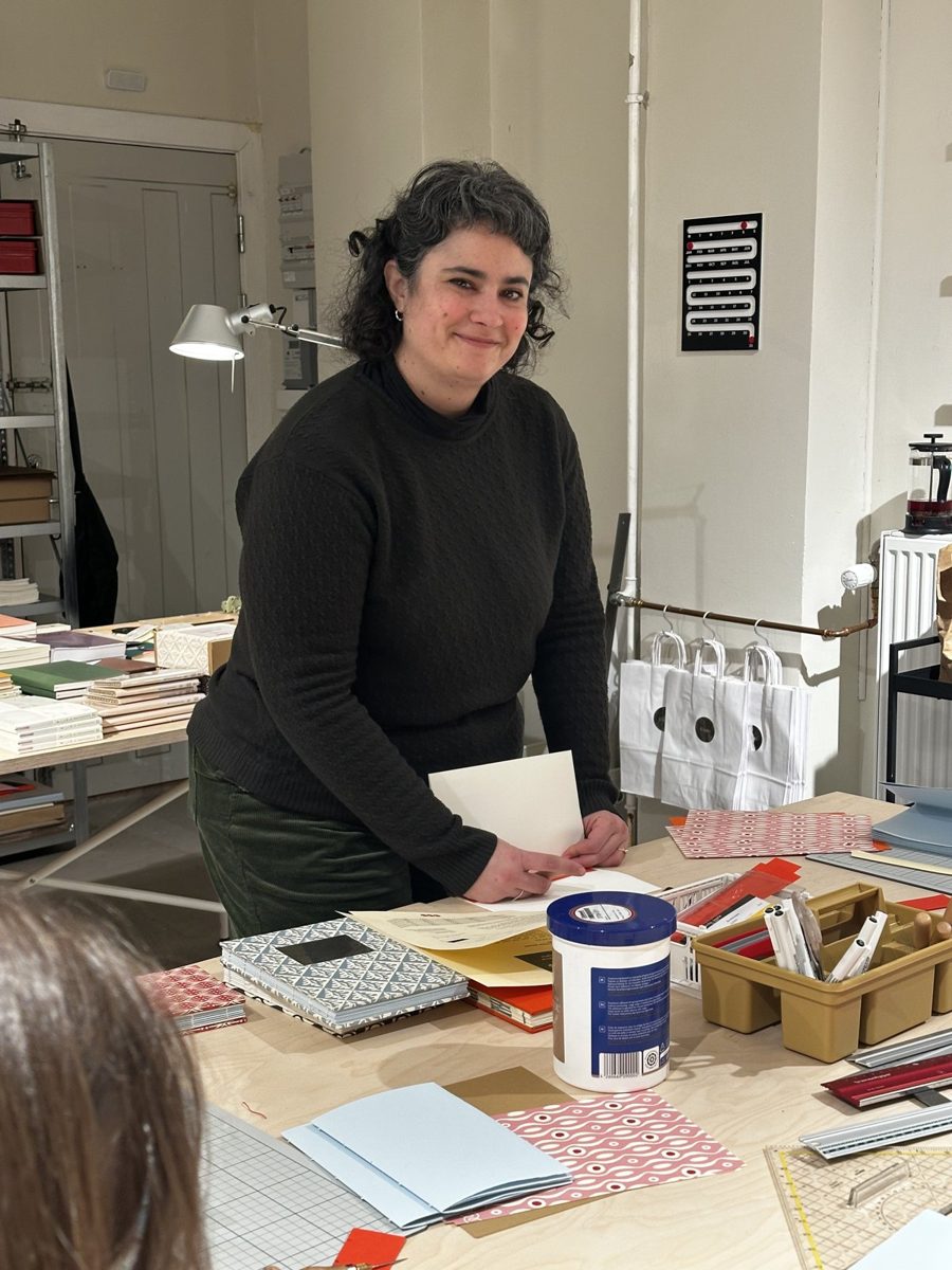 Paula teaching a bookbinding workshop